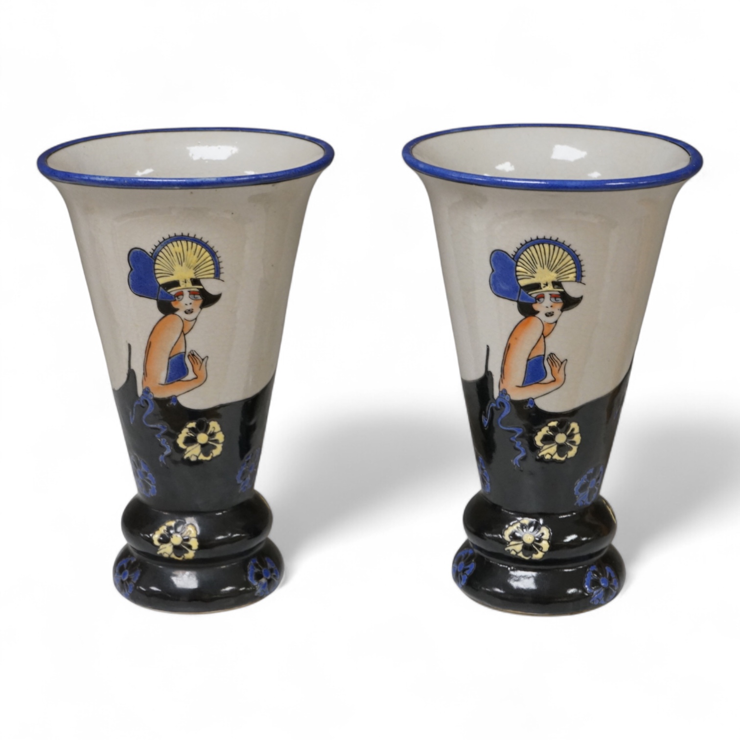 A pair of Longwy style 'flapper lady' pottery vases